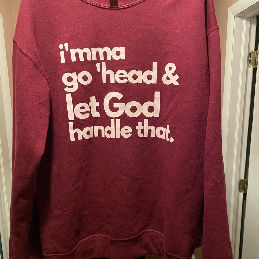 LET GOD HANDLE THAT UNISEX SWEATSHIRT